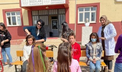 Köy okullarındaki öğrencilere saç bakımı